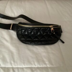 Black small bag for quick errands.